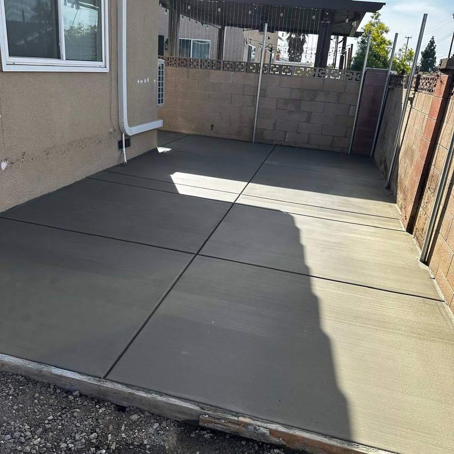 New backyard patio slab poured against the house
