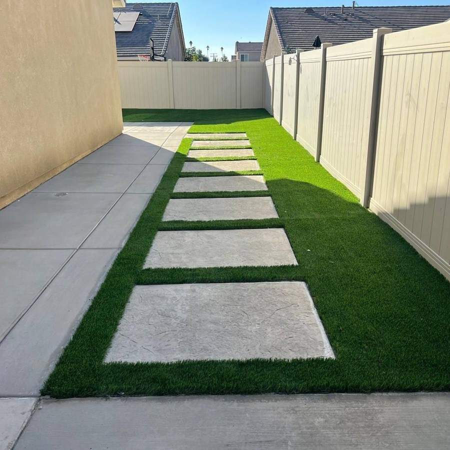Concrete stepping stones set in turf