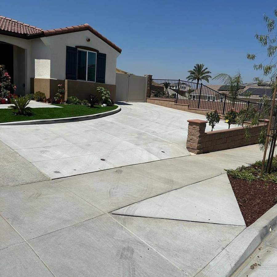 Concrete driveway with planter cutouts
