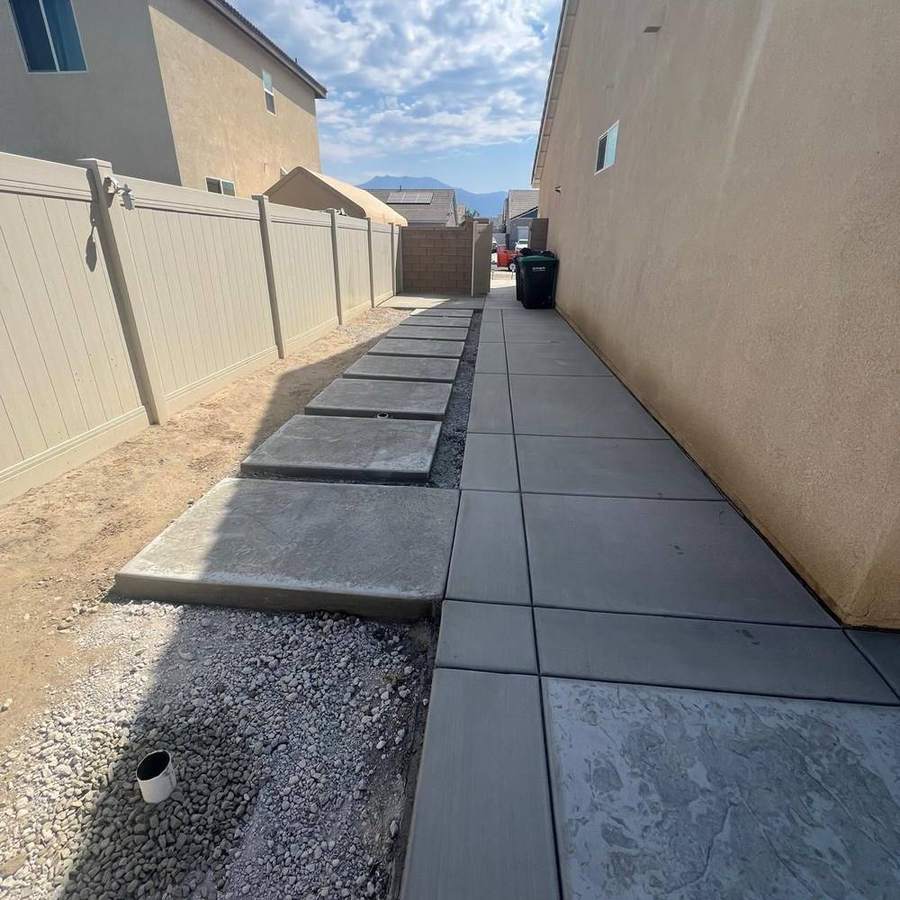 Side yard walkway along a fence